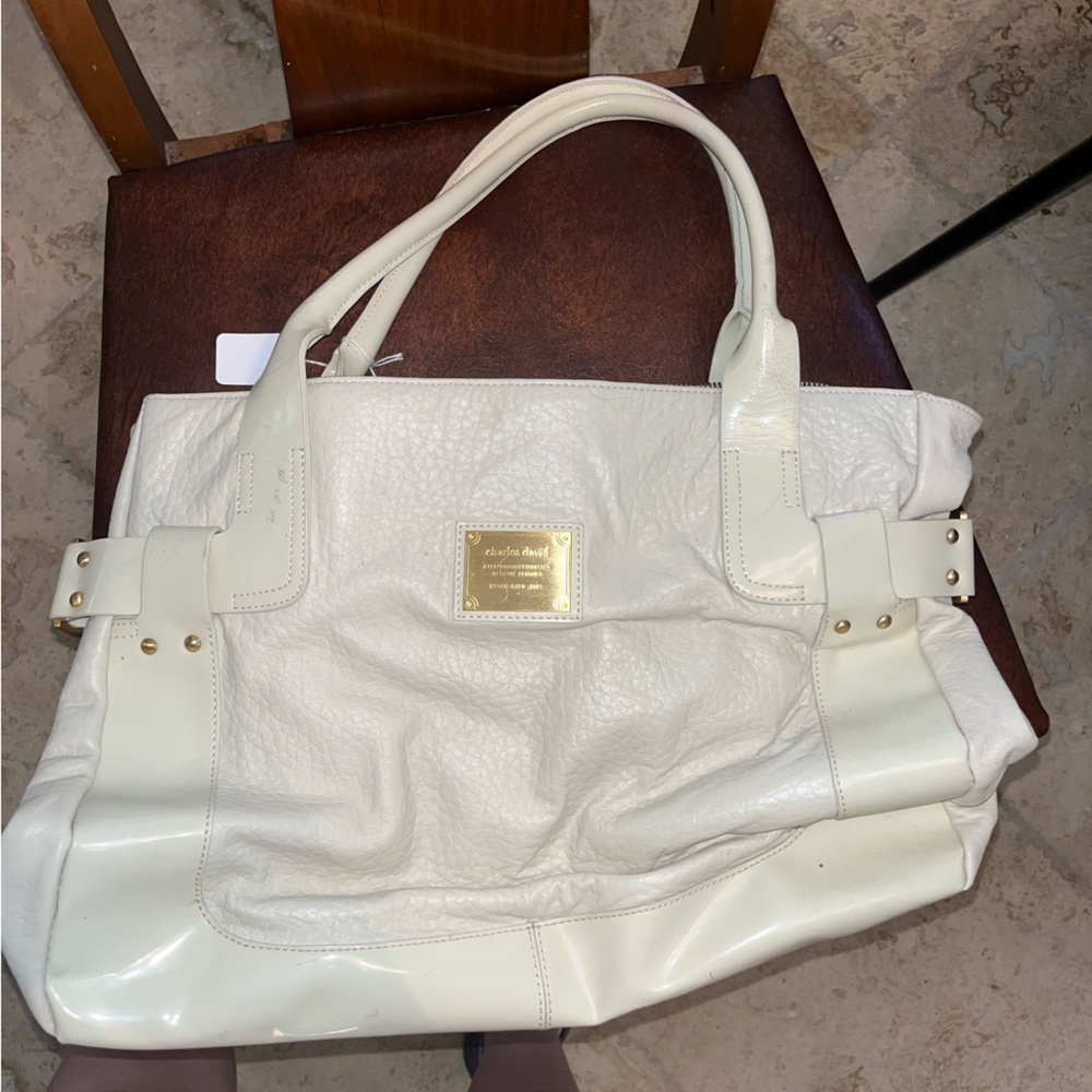Charles David white pebble purse with leather trim and zipper close